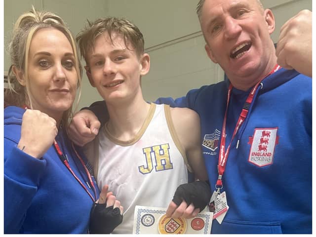 Gosport and boxing are mourning the death of Gosport ABC head coach Darren Blair, at the age of 54. Blair is here, right, with boxer Jack Harrop, centre, and Blair's partner Leandra Hunter, left.