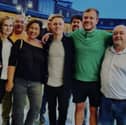 Sarah (second from left) and Deucalion (centre) with their colleagues for 1Drive who will be completing a charity walk in March in aid of Macmillan Cancer Support.