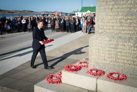 Foreign Secretary Lord David Cameron attends a wreath laying ceremony at the Falklands conflict memorial in Port Stanley on the Falkland Islands, during his high-profile visit to demonstrate they are a "valued part of the British family" amid renewed Argentinian calls for talks on their future. Picture: Stefan Rousseau/PA Wire.