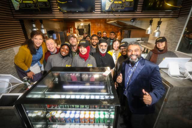 Owner Shamsul Alam (in blue jacket) with customers and staff at the opening of Doner Depot, Albert Road, Southsea
Picture: Chris Moorhouse 