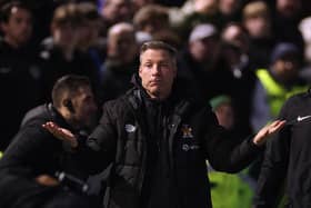 Neil Harris has left Cambridge United to return to former club Millwall.
