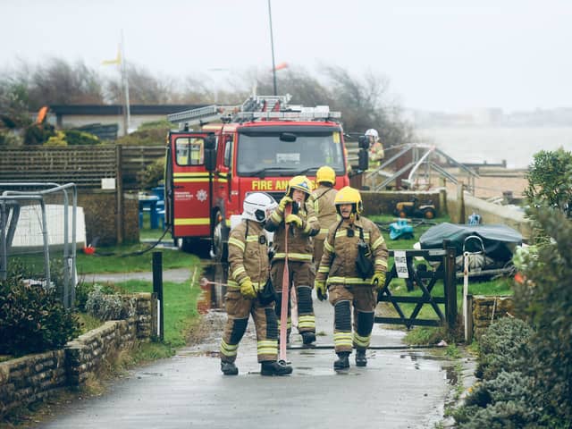 Firefighters at the scene of a fire in Hill Head.