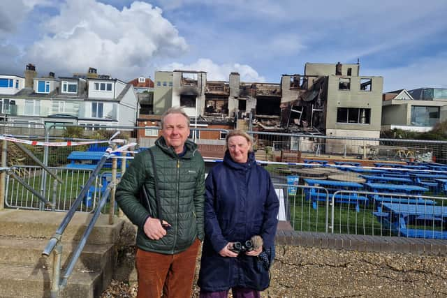 Brother and sister Ben and Sally at The Osborne View pub the day after it was destroyed in a huge fire.