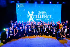 The News Business Excellence Awards winners 2024 line up on the stage after an evening of celebration.