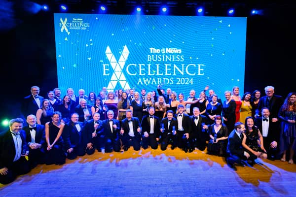 The News Business Excellence Awards winners 2024 line up on the stage after an evening of celebration.