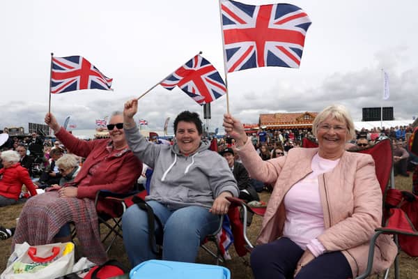 Residents watching the commemorations on the big screen at D-Day 75