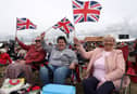 Residents watching the commemorations on the big screen at D-Day 75