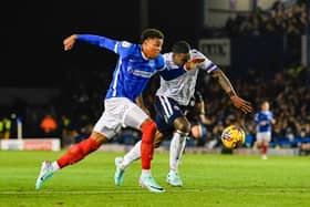 Pompey striker Kusini Yengi gave Bolton defender Ricardo Santos a torrid time at Fratton Park back in December