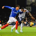 Pompey striker Kusini Yengi gave Bolton defender Ricardo Santos a torrid time at Fratton Park back in December
