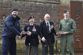 Two Second World War veterans who were involved in the D-Day landings were left honoured after their names were placed on the Normandy Memorial Wall in Southsea. They were awarded plaques 100 days before the 80th anniversary of D-Day, with a major commemoration event taking place in Portsmouth. Pictured is: (l-r) Ian Peattie, Royal Navy captain, D-Day veterans Stan Ford, 98, and John Roberts, 99, and Luke Jules, RAF Squadron Leader. Picture: Sarah Standing (270224-7778)