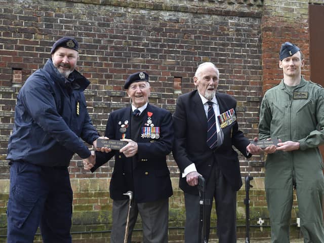 Two Second World War veterans who were involved in the D-Day landings were left honoured after their names were placed on the Normandy Memorial Wall in Southsea. They were awarded plaques 100 days before the 80th anniversary of D-Day, with a major commemoration event taking place in Portsmouth. Pictured is: (l-r) Ian Peattie, Royal Navy captain, D-Day veterans Stan Ford, 98, and John Roberts, 99, and Luke Jules, RAF Squadron Leader. Picture: Sarah Standing (270224-7778)