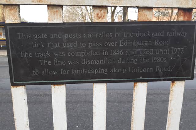The plaque on the original level crossing gate in Edinburgh Road