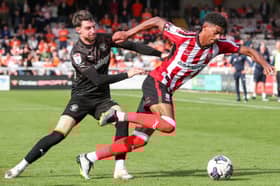 Former Pompey winger Reeco Hackett has scored four goals in his last five games for Lincoln. Picture: Camera Sport - Alex Dodd
