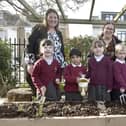 Meon Infant School, Meon Junior School and Moorings Way Infant School in Milton have replaced parts of their paved playgrounds with plants and trees, to encourage pupils to spend more time outside during lessons and breaks, and to learn more about nature.Pictured is: (back l-r) Sara Paine, executive head for Meon Way Federation and cllr Kimberly Barrett, cabinet member for climate change and greening the city with (front l-r) Casey Bayes, Priyansh Shah, Meredith Drudge, Jack Donnelly and Paddy O'Hara from Milton Neighbourhood Forum.