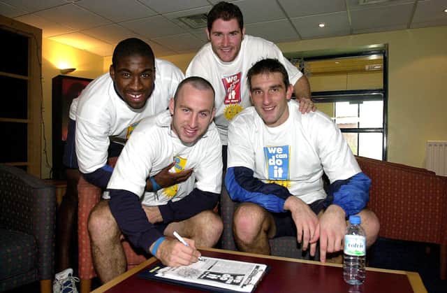 Darren Moore and Lee Bradbury pictured with Shaun Derry and Russell Hoult while Pompey players.