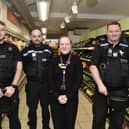 Pictured is: Daisy Potter, manager at Sainsbury's Local in Guildhall Walk, Portsmouth, with (l-r) PC Jonathan Tallent, PCSO Georgi Berkov and Sgt Paul Marshall.
