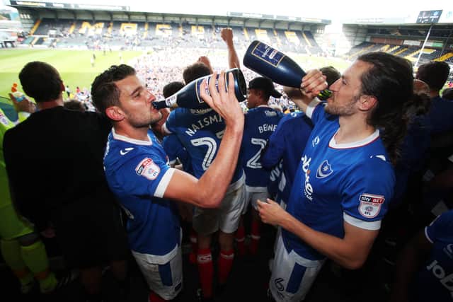 Christian Burgess celebrates League Two promotion at Notts County with Gareth Evans in April 2017. Picture: Joe Pepler