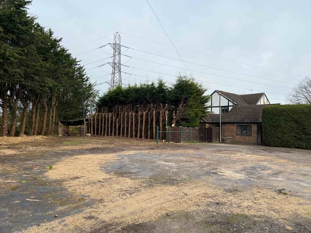 House and former car sales unit up for auction with planning permission to demolish existing buildings and part demolition of existing house. 
