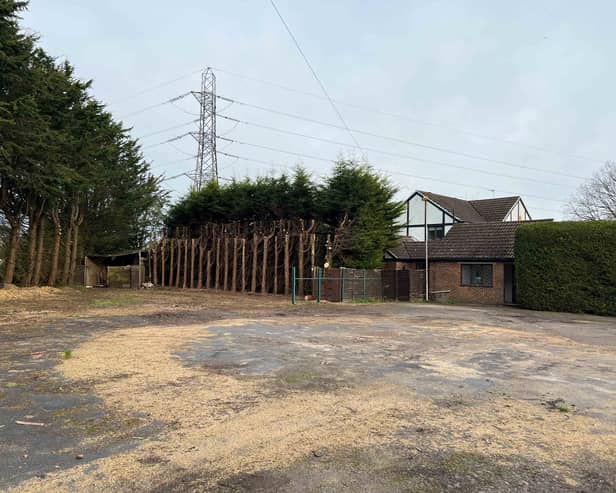 House and former car sales unit up for auction with planning permission to demolish existing buildings and part demolition of existing house. 