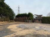 House and former car sales unit up for auction with planning permission to demolish existing buildings and part demolition of existing house. 
