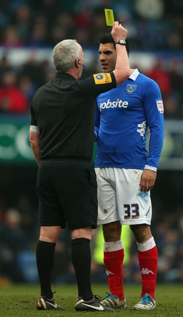 Pompey's Ricardo Rocha is booked in the League One match against Coventry in March 2013. Picture: Bryn Lennon/Getty Images