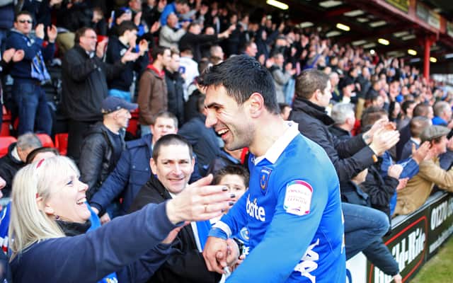 Ricardo Rocha celebrates with fans after Pompey's 2-1 victory at Crewe in March 2013. The Blues had ended a run of 23 matches without a win. Picture: Joe Pepler