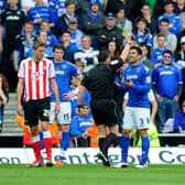 Ricardo Rocha is booked after striking Adam Lallana in Pompey's 2-2 draw at Southampton in April 2012. Picture: Allan Hutchings