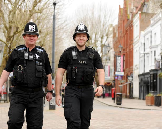 Pictured is: (l-r) Sgt Paul Marshall and PC Jonathan Tallent patrolling Guildhall Walk in Portsmouth.