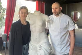 The owners of Smoke and Mirrors in Old Portsmouth, Caitlyn Odin and Jordan Thompson, have been gifted the Venus De Milo statue by Mike Barnett. 