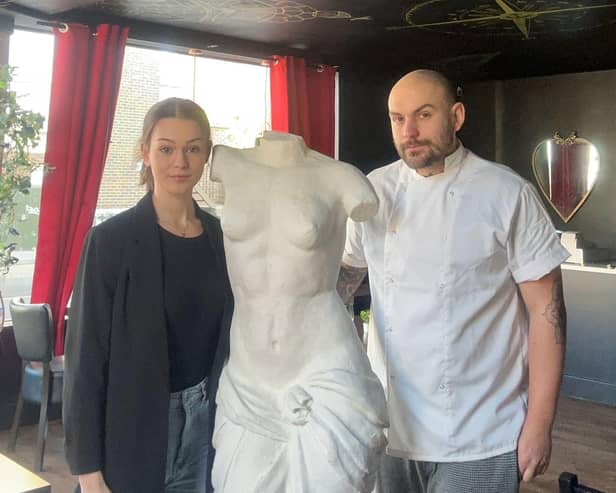 The owners of Smoke and Mirrors in Old Portsmouth, Caitlyn Odin and Jordan Thompson, have been gifted the Venus De Milo statue by Mike Barnett. 