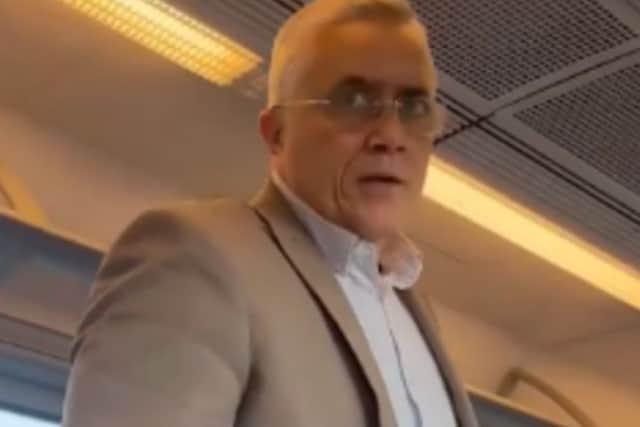 Police would like to speak to this man after a teenage girl was punched in the face aboard a train travelling between Alton and Aldershot. Picture: British Transport Police.