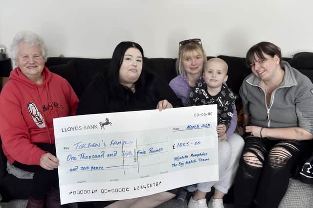 
Pictured is: (l-r) Elizabeth Humphries from The Big Match, Amy Hayward, Steph Dadd, Torben Hayward (7) and Stacey Donnelly. Steph and Stacey are from a private ambulance service who have helped Torben. Picture: Sarah Standing (070324-8521)

