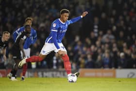 Kusini Yengi produces his outrageous Panenka penalty in Pompey's win over Burton. Pic: Jason Brown/ProSportsImages