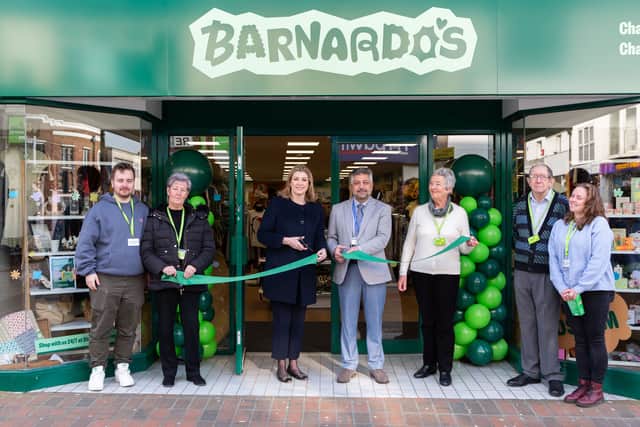 Pictured: Rt Hon Penny Mordaunt MP, Councillor Asghar Shah, Barnardo’s Colleagues, Store Associates and Volunteers, and Barnardo’s retail customers. 