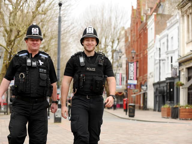 Pictured is: (l-r) Sgt Paul Marshall and PC Jonathan Tallent patrolling Guildhall Walk in Portsmouth.Picture: Sarah Standing 