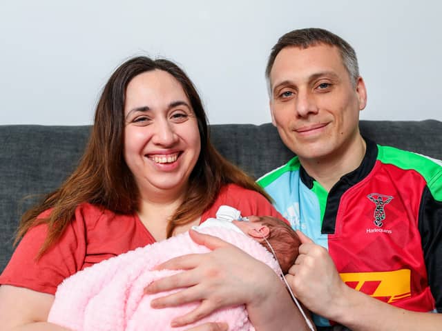 Steph Lorrabaquio and Dave Richardson with their daughter, Millie, who was born three months early on Christmas Day. They were allowed to take her home on March 11th