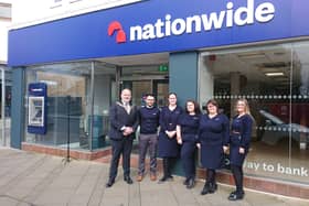 Nationwide in Fareham has undergone a major refurb, with the business pledging to keep the location open until at least 2026. Pictured is staff and the mayor of Fareham. Picture: The News.