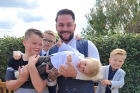 Rick Smith, of Fareham, alongside his children.