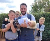 Rick Smith, of Fareham, alongside his children.