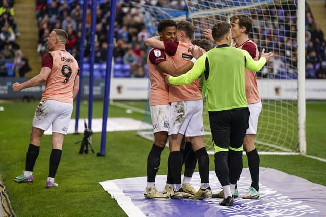 Pompey celebrate Kusini Yengi's winning goal at Peterborough. Picture: Jason Brown/ProSportsImages