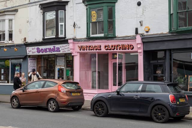 Merlin Pitt's new vintage clothing shop on Albert Road in eye-catching pink. Picture: Mike Cooter (160324)