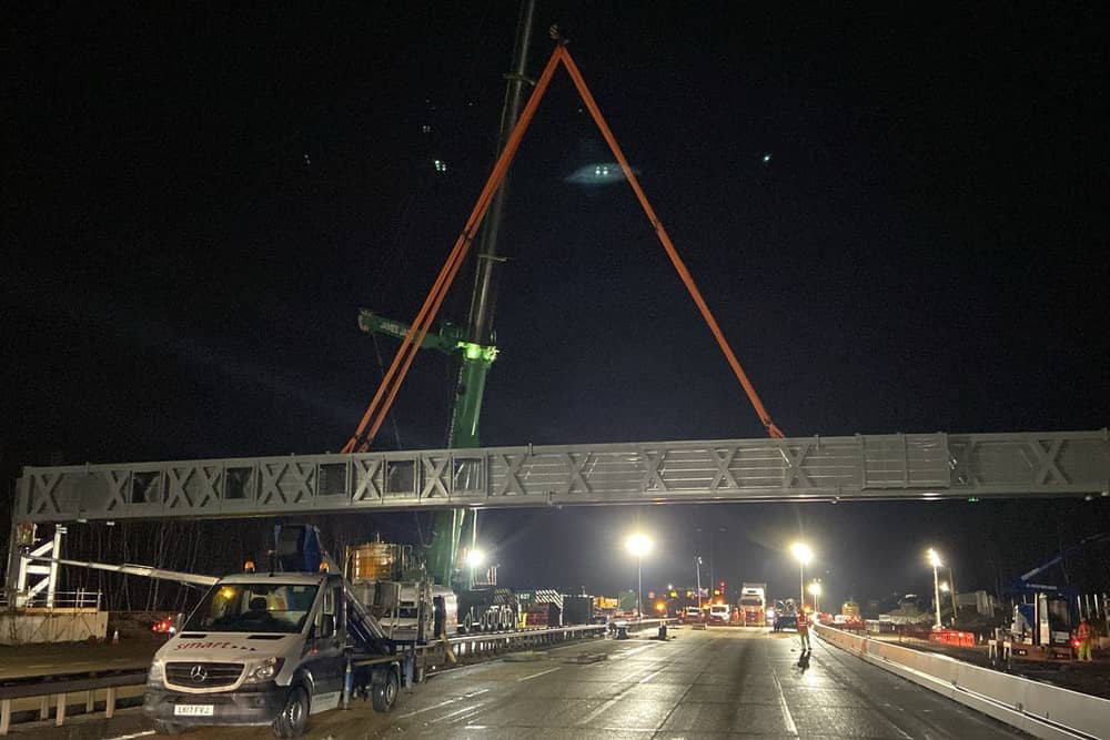 The M25 has reopened eight hours earlier than planned after the first ever daytime closure of the busy motorway to demolish a bridge and install a new gantry. (Credit: National Highways: South-East/PA Wire)