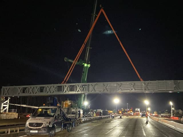 The M25 has reopened eight hours earlier than planned after the first ever daytime closure of the busy motorway to demolish a bridge and install a new gantry. (Credit: National Highways: South-East/PA Wire)