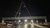 The M25 has reopened eight hours earlier than planned after the first ever daytime closure of the busy motorway to demolish a bridge and install a new gantry. (Credit: National Highways: South-East/PA Wire)