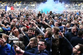 Pompey fans are eyeing a final-day promotion part at Lincoln similar to scenes at Notts County in 2017. Pic:Bluepitch Media / Joe Pepler