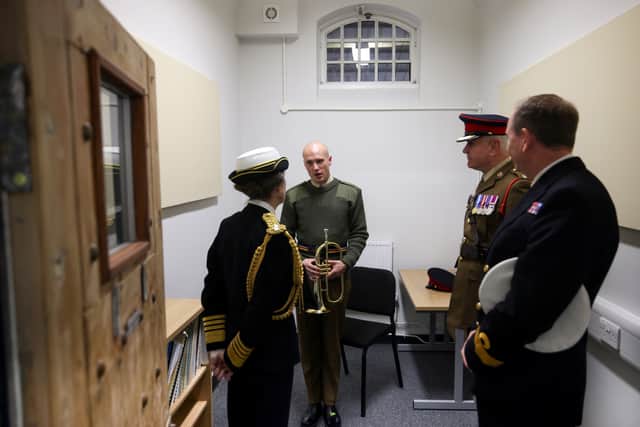 Pictured: HRH The Princess Royal at The Music Practice Cell escorted by Major Green (RM).Her Royal Highness The Princess Royal visited His Majesty's Naval Base Portsmouth, the home of the Royal Navy, to meet with members of the Royal Marines Band Service and the Corps of Army Music, and officially open the brand new training facility.