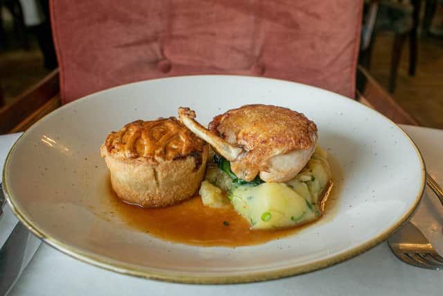 Roast chicken breast with champ, a cheese and leak pie, buttered spinach and a chicken butter sauce.
Picture: Habibur Rahman