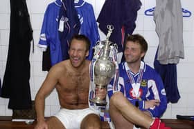 Paul Merson and Tim Sherwood in the Fratton Park dressing room after helping the Blues lift the 2002-03 old First Division title