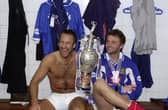 Paul Merson and Tim Sherwood in the Fratton Park dressing room after helping the Blues lift the 2002-03 old First Division title