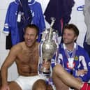 Paul Merson and Tim Sherwood in the Fratton Park dressing room after helping the Blues lift the 2002-03 old First Division title